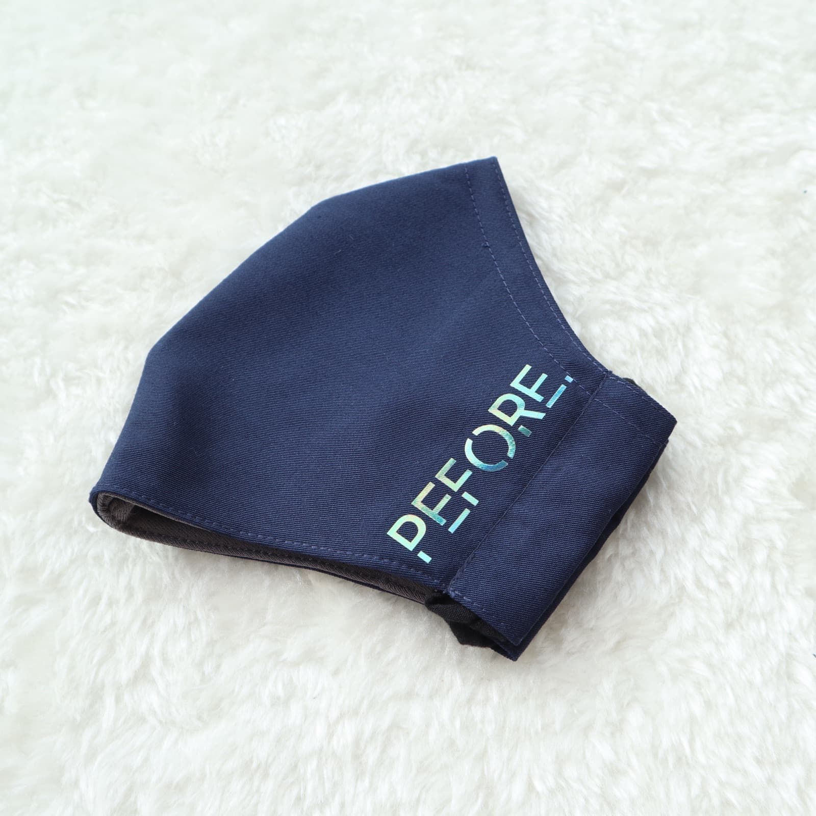 Navy mask with PEFORE. logo printed on the side