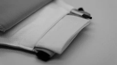 Filter pocket opening on the inside of the mask